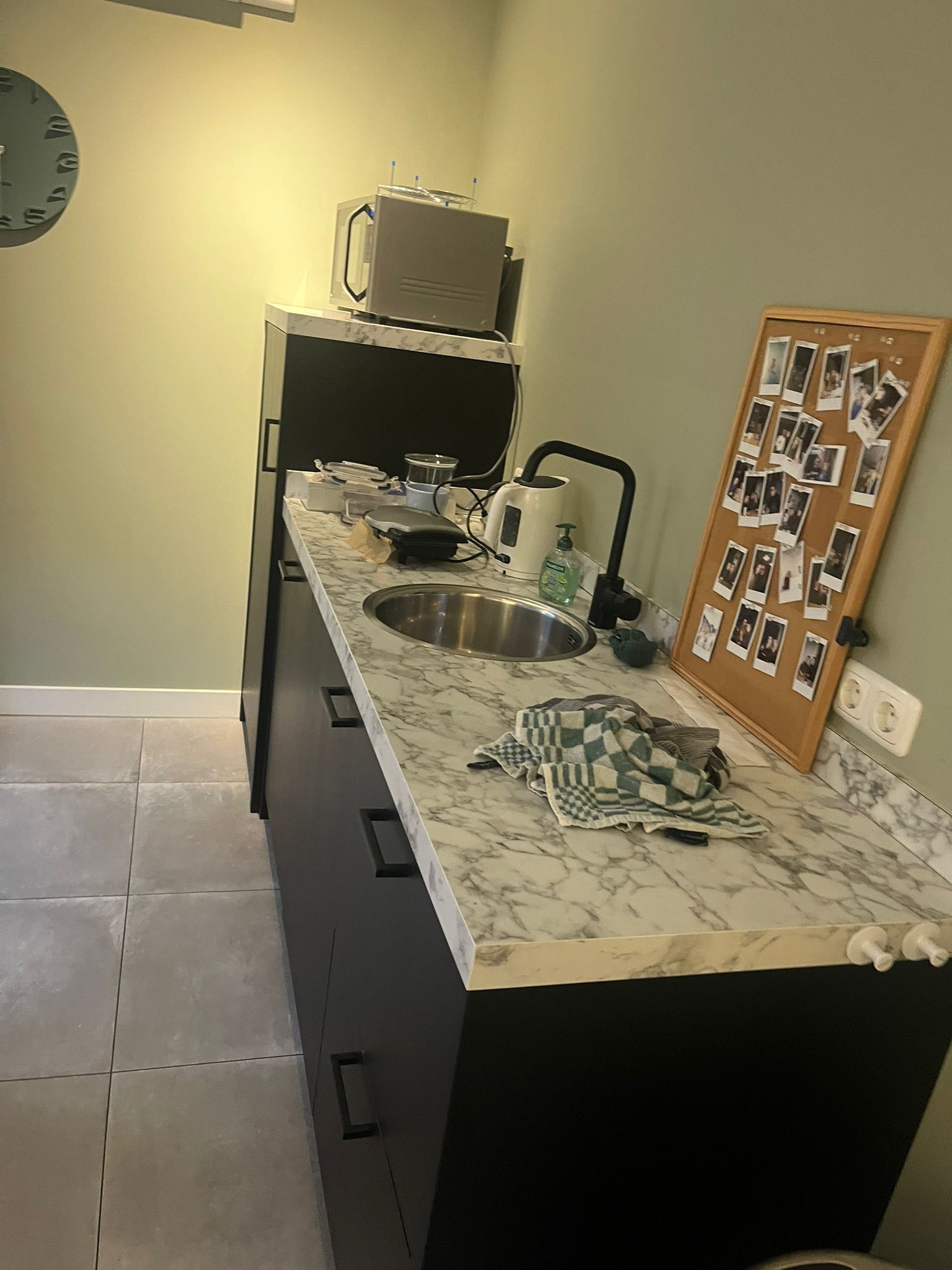 Modern kitchen before professional cleaning